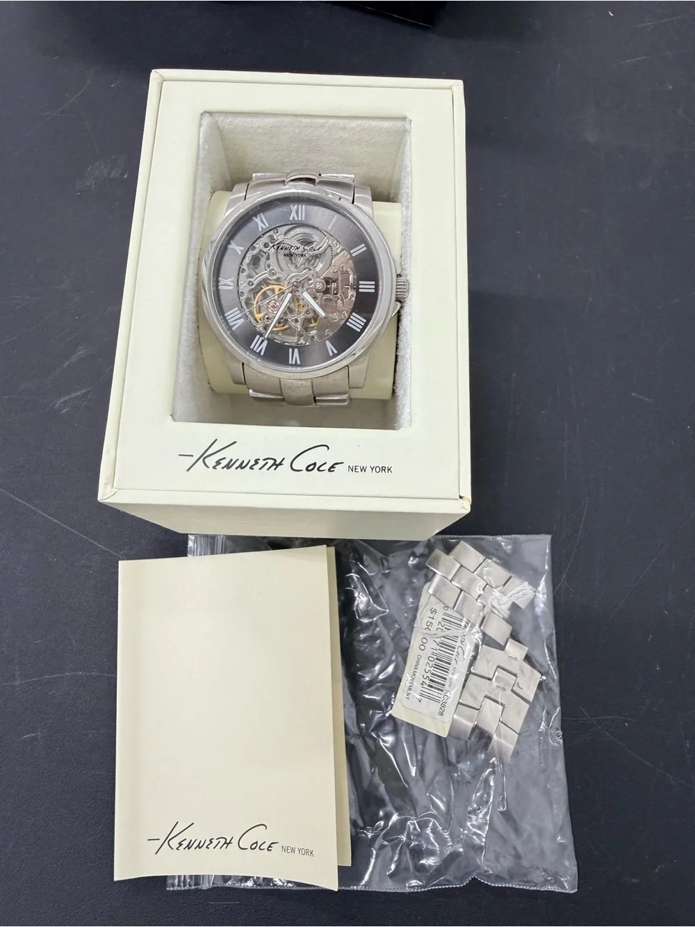 Kenneth Cole Silver Men’s Skeleton Dial Stainless Steel Bracelet Watch